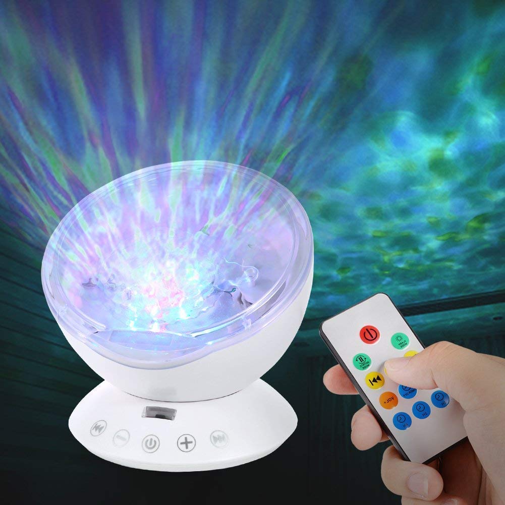 Projecteur Ocean Wave: Une veilleuse avec 7 effets visuels différents, à associer à votre propre audio. Convient pour dormir et snoezelen.
