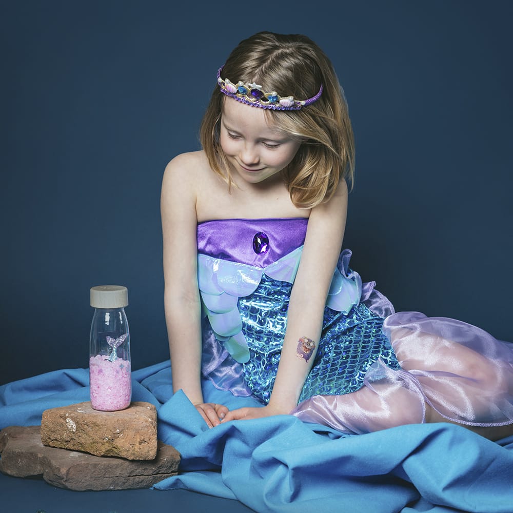 prachtig glinsterend en roze is de zeemeermin fles van petit boum