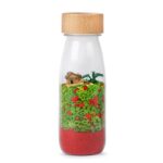 La bouteille sensorielle petit boum dragon stimule les sens chez les petits et les grands, secouez, regardez et écoutez