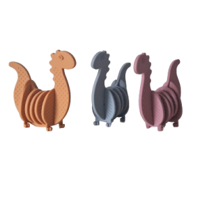 Jouet de dentition Dino qui répond aux besoins de mastication des jeunes enfants