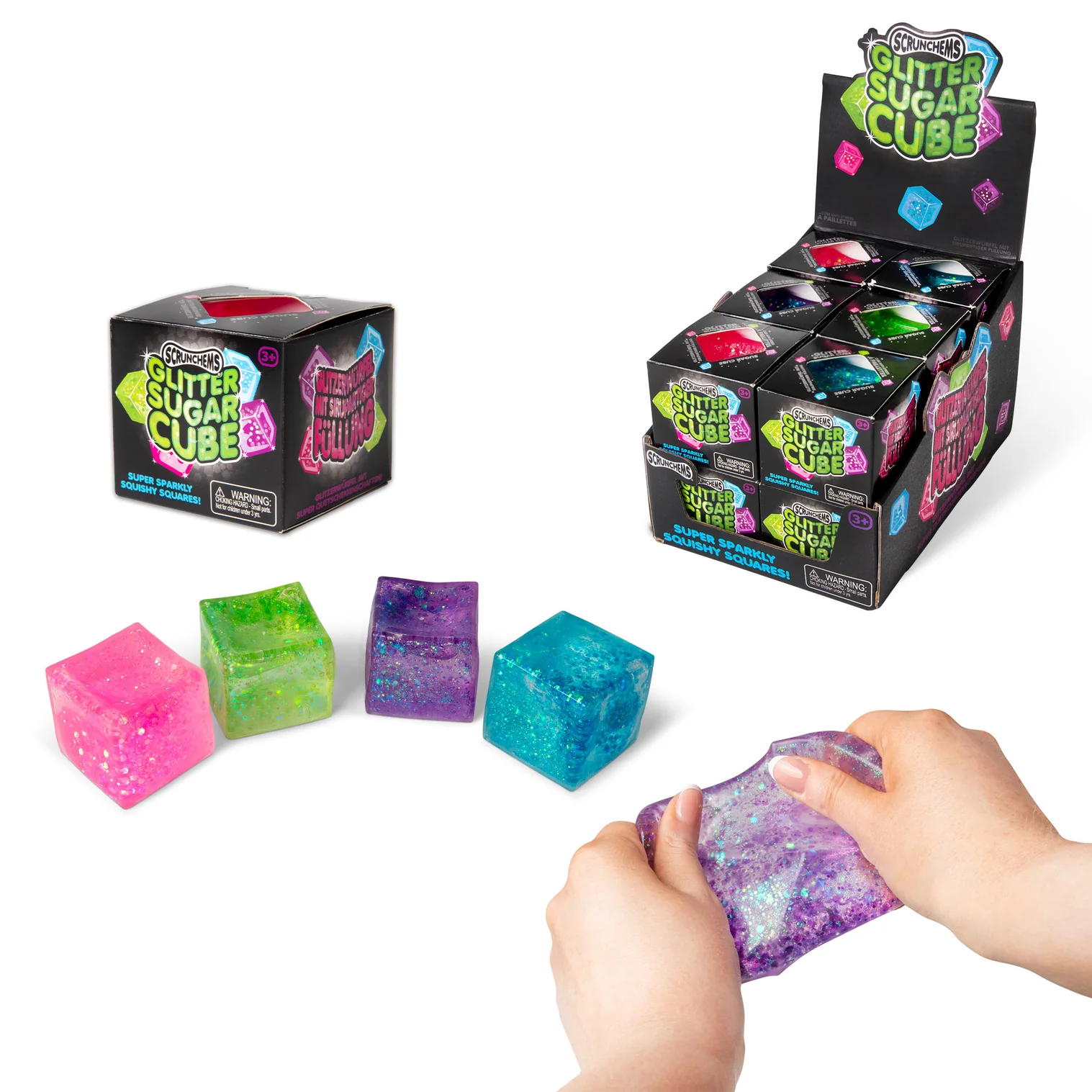 Scrunchems Glitter Cube, un squishy cube doux avec des paillettes et un remplissage en gel, parfait pour la relaxation, la réduction du stress et le jeu sensoriel.